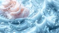 Close-up of a pink rose submerged in a clear liquid with bubbles