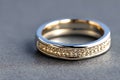 stunning close up shot of a single wedding rings, delicately intertwined to symbolize the everlasting bond of love and commitment Royalty Free Stock Photo