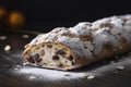 A stunning close-up view of a German stollen, with a dusting of powdered sugar.
