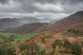 Stunning colorful Autumn landscape image of view from Castle Crag towards High Stile and Glaramara in Lake District Royalty Free Stock Photo