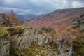 Stunning colorful Autumn landscape image of view from Castle Crag towards High Stile and Glaramara in Lake District Royalty Free Stock Photo