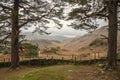 Stunning colorful Autumn landscape image of view from Castle Crag towards High Stile and Glaramara in Lake District Royalty Free Stock Photo