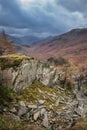 Stunning colorful Autumn landscape image of view from Castle Crag towards High Stile and Glaramara in Lake District Royalty Free Stock Photo