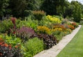 Stunning, colourful mixed perennial flower borders at the RHS Wisley garden, Surrey UK.