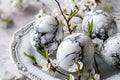 Stunning composition of easter eggs with intricate black and white marble patterns on white plate