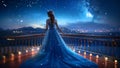 A Beautiful Queen or Princess Wearing a Flowy Sparkling Neon Blue Dress on a High Balcony Looking Down at City Lights Royalty Free Stock Photo