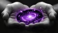 Palm of Hands Holding a Cosmic Glowing Purple Galaxy and Galactic Stars and Constellations (Black Hole) Royalty Free Stock Photo