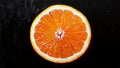 Fresh, Organic, Sweet, Tangy, Citrus Orange Fruit in a Black Background Royalty Free Stock Photo