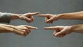 Fingers Pointing Blaming One Another in a Heated Argument (Responsibility, Accountability, Accusation, Reprimand, Feud) Royalty Free Stock Photo