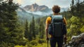 A man Hiking, Backpacking, Mountaineering Alone in a Peaceful Forest on a Serene Mountain Breathing Fresh Air Royalty Free Stock Photo
