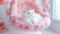 A Beautiful Girly White Kitty Cat Princess Wearing a Royal Crown on a Luxurious Fluffy Flowery Pink Floating Chair Royalty Free Stock Photo