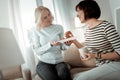 Stunning couple eating croissants from one plate