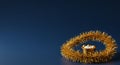 Golden tinsel framing three spheres on navy background Royalty Free Stock Photo