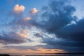 Stunning dramatic colorful stormy landscape sunset sky with lovely moody contrast in the clouds