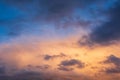 Stunning dramatic colorful stormy landscape sunset sky with lovely moody contrast in the clouds