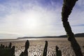 Circular sun halo as viewed from beside a boatwreck on Red Wharf Bay, Area of Outstanding Natural Beauty, Anglesey, North Wales