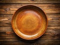 A Stunning Empty Rustic Brown Pottery Plate Closeup Detail of Handcrafted Earthenware Showcasing Mottled Texture and Royalty Free Stock Photo