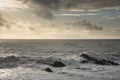 Stunning fine art landscape image of view from Hartland Quay in Devon England durinbg moody Spring sunset Royalty Free Stock Photo