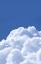 Fluffy White Cumulus Clouds on Vibrant Blue Sunny Sky