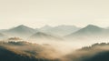 Serene And Calming Mountainous Scenery Surrounded By Fog