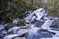 Stunning Frozen Hassafallen Waterfall in Wintry Rural Woodlands Royalty Free Stock Photo