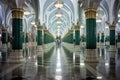 A stunning and grand hallway in a building adorned with tall columns and elegant chandeliers., Nabawi Masjid, a mosque in Al Royalty Free Stock Photo