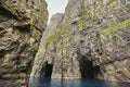 Stunning green cliffs and cave. Atlantic ocean, Faroe islands