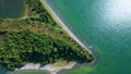 Stunning green island landscape drone view. Dense tree tops growing cape hills