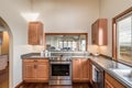 Stunning hard wood floor kitchen with arch doorway real estate