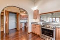 Stunning hard wood floor kitchen with arch doorway real estate