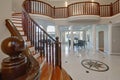 Stunning high ceiling entry foyer with marble mosaic tiled floor