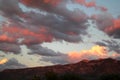 Stunning hot pink clouds over the red mountains at sunset in Tucson Arizona Royalty Free Stock Photo