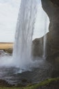 Stunning Iceland landscape photography. Beautiful waterfall Seljalandsfoss on the country side in the mountains of Iceland