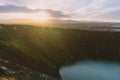 Stunning Iceland landscape photography. Picture of vilcano Kerid with sunset. From Icy fjords to snowy mountains to ice lagoons