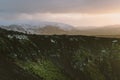 Stunning Iceland landscape photography. Picture of vulcano Kerid with sunset. From Icy fjords to snowy mountains to ice lagoons