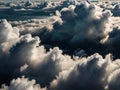 Dramatic cloudscape showcasing towering cumulus clouds with dynamic light and shadow play Royalty Free Stock Photo