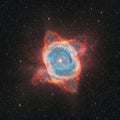 The Ring Nebula, a cosmic circular marvel. Royalty Free Stock Photo