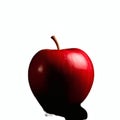 High contrast low key photograph of a vibrant red apple Royalty Free Stock Photo