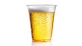 A stunning image of Front view of draught beer in plastic disposable cup isolated on white. Royalty Free Stock Photo
