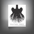 A stunning image of a guitar and tree