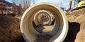 A stunning image of Large Drainage Pipe in Construction Site Trench. Royalty Free Stock Photo