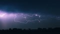 Stunning image of a lightning bolt illuminated in the purple night sky Royalty Free Stock Photo