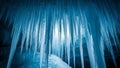 Ice Cave with Long Icicles in. Royalty Free Stock Photo