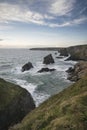 Stunning landcape image of Bedruthan Steps on Cornwall coast in