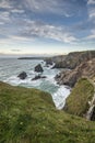 Stunning landcape image of Bedruthan Steps on Cornwall coast in