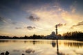 Stunning landscape floating mosque at Terengganu, Malaysia over golden sunset background