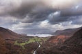 Stunning landscape image of the view from Castle Crag towards Derwentwater, Keswick, Skiddaw, Blencathra and Walla Crag in the Royalty Free Stock Photo