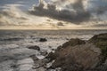 Stunning landscape image of view from Hartland Quay in Devon England durinbg moody Spring sunset Royalty Free Stock Photo