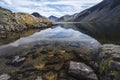 Stunning landscape of Wast Water with reflections in calm lake w