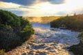 Stunning landscrape of roaring waterfalls at sunset Royalty Free Stock Photo